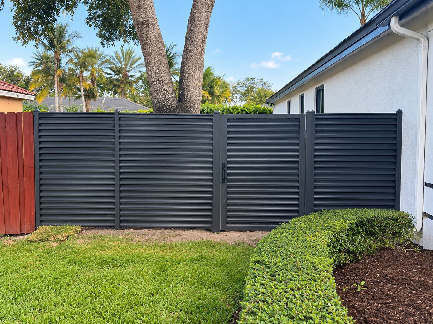 Backyard louvered fence