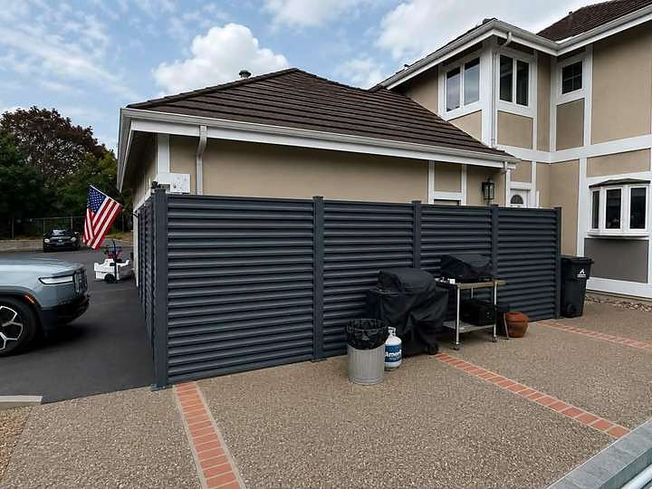 Driveway louvered fence