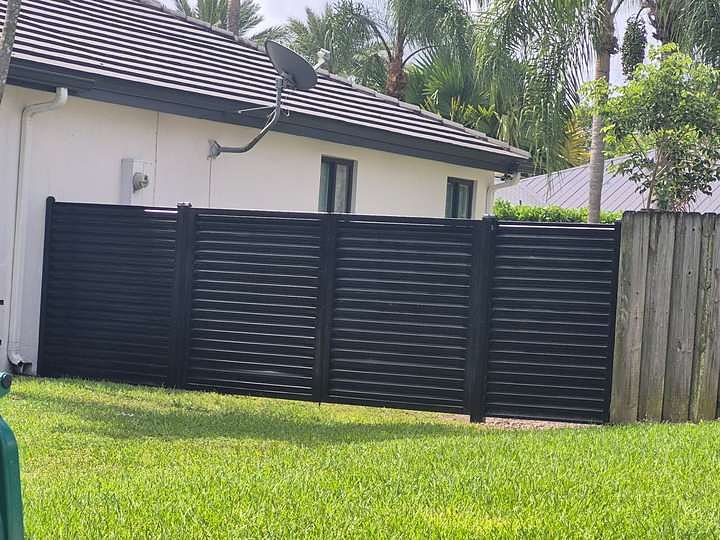 Residential louvered fence